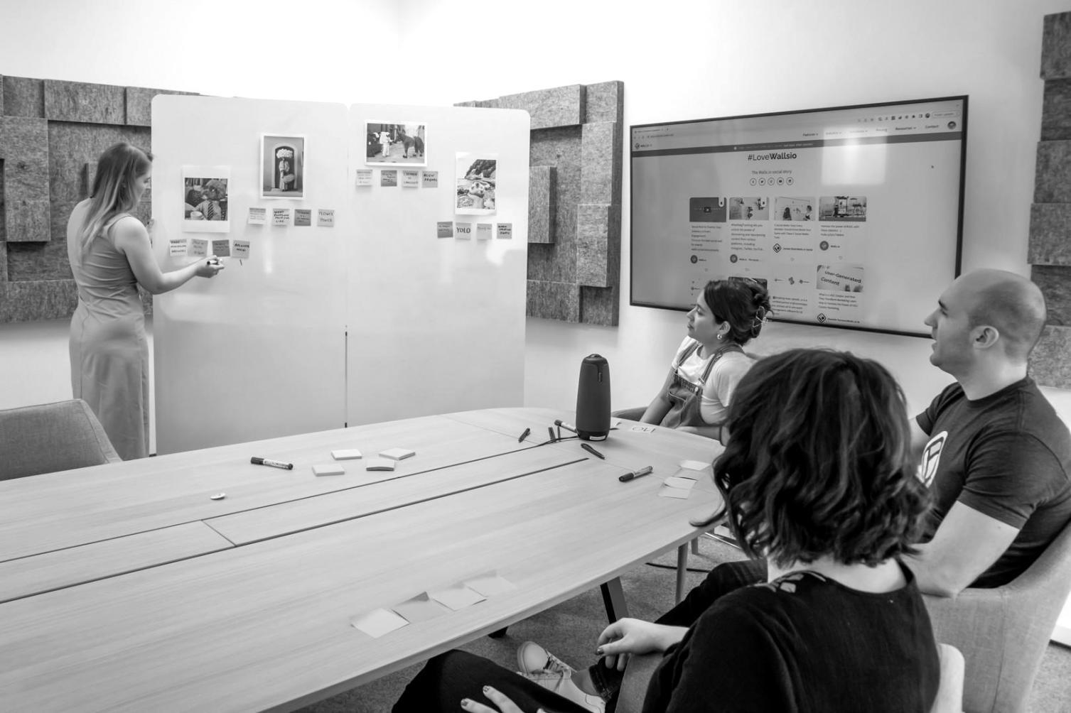 Business meeting with financial documents and growth charts